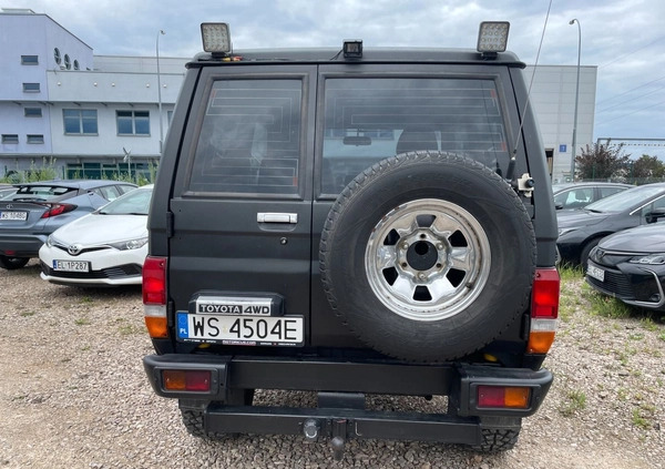 Toyota Land Cruiser cena 69900 przebieg: 363433, rok produkcji 1987 z Olsztyn małe 211
